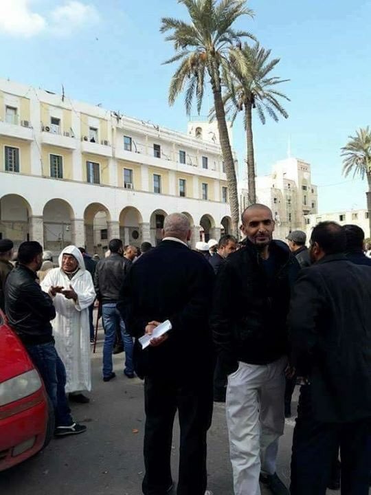 Protests in Martyr Square Tripoli  against closure of banks due to lack of cash. Road blocked Libya  