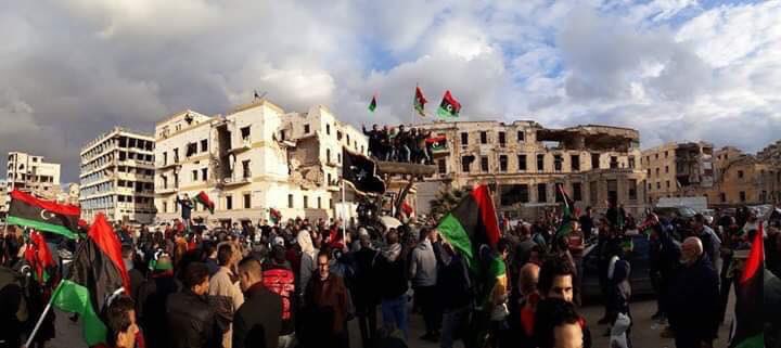 Benghazi spontaneously celebrates the February revolution outside the destroyed court house   