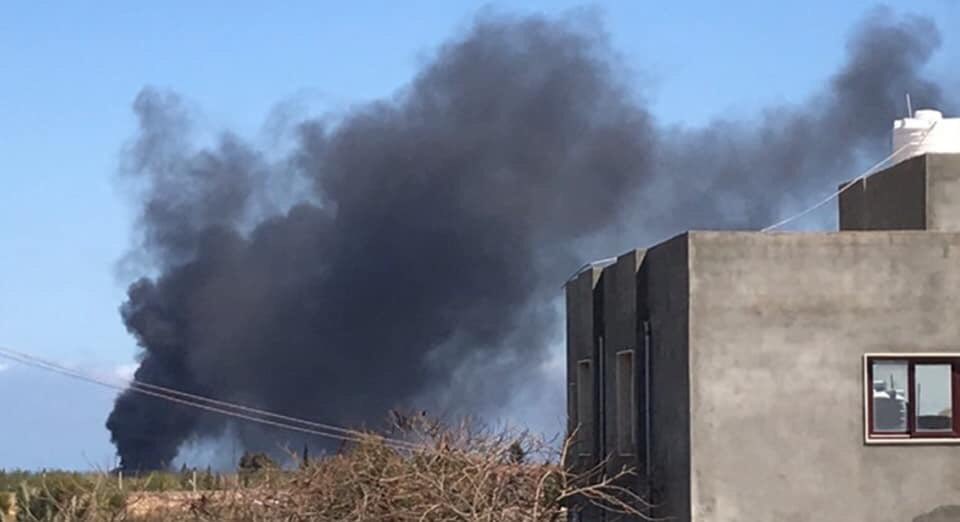 Pictures of heavy smoke rising from the garrison camp in Tajoura, where the 33rd Infantry Regiment is based, led by the Bashir Khalafullah al-Maqni, al-Baqarah following an air strike carried out by the LNA Air Force. 
