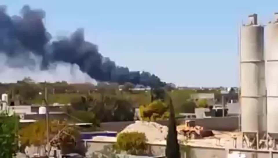 Pictures of heavy smoke rising from the garrison camp in Tajoura, where the 33rd Infantry Regiment is based, led by the Bashir Khalafullah al-Maqni, al-Baqarah following an air strike carried out by the LNA Air Force. 