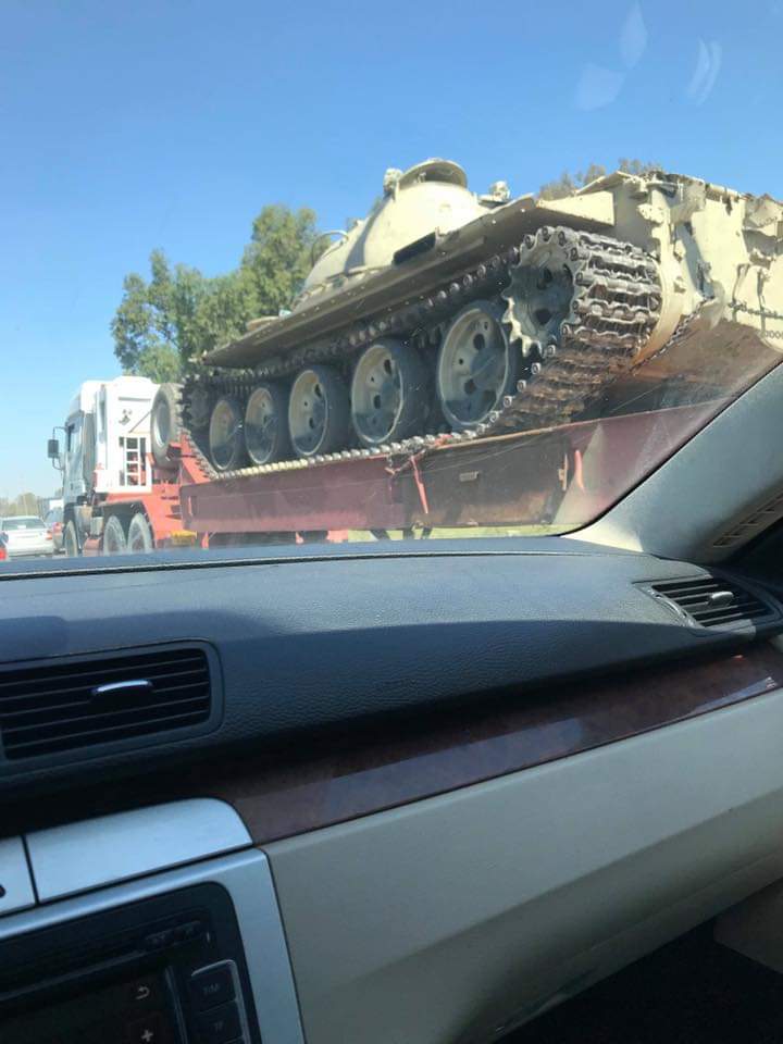 Trucks carrying tanks and howitzer in Qawaya area of Tripoli