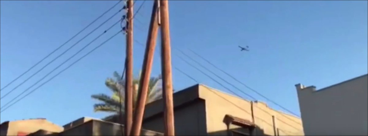 Libya- photos from video purportedly showing Bayraktar TB2 UAV, in support of GNA and made by Turkey, over Tripoli and descending to land at Mitiga International Airport   