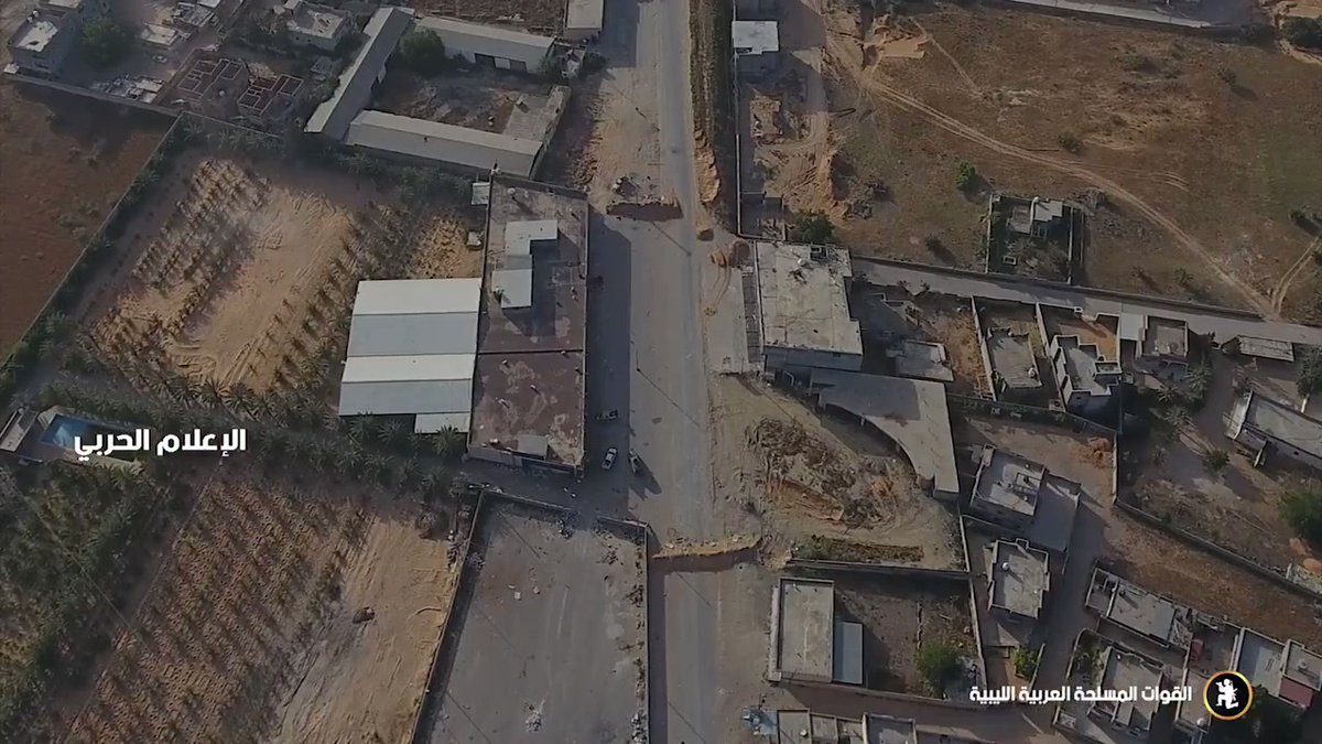 First batch of LNA (alleged drone) strikes on a GNA checkpoint geolocated here  along Ayn Zarah Rd south of Tripoli, Libya. Video was published on June 11, 2019. (Video ht @bottidavid).   