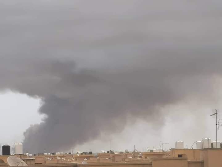 Photos showing smoke still billowing from the targeted ammunition depot inside Tajoura's Rahba barracks. 