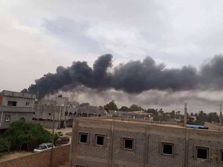Photos showing smoke still billowing from the targeted ammunition depot inside Tajoura's Rahba barracks. 