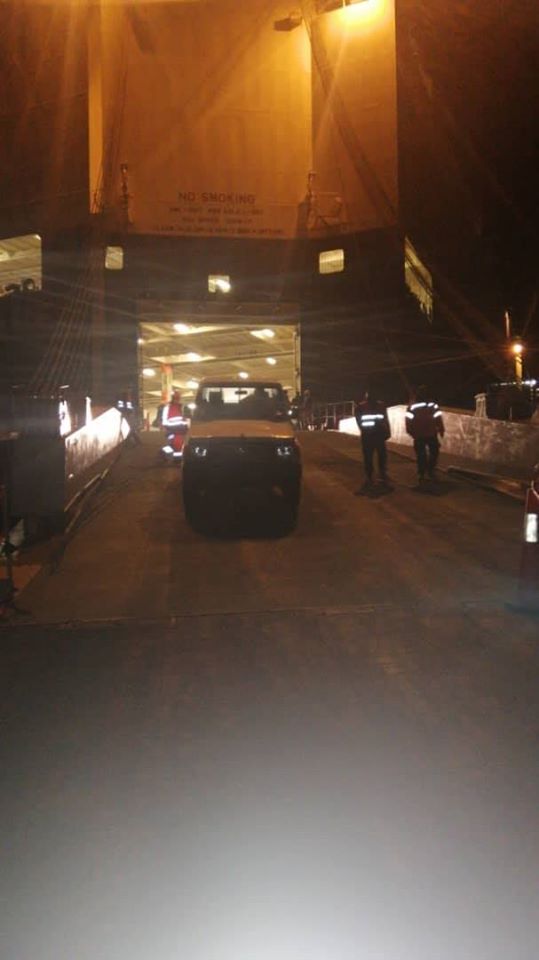 Photos purportedly showing pickup tucks supplied to LNA being unloaded in Benghazi Port
