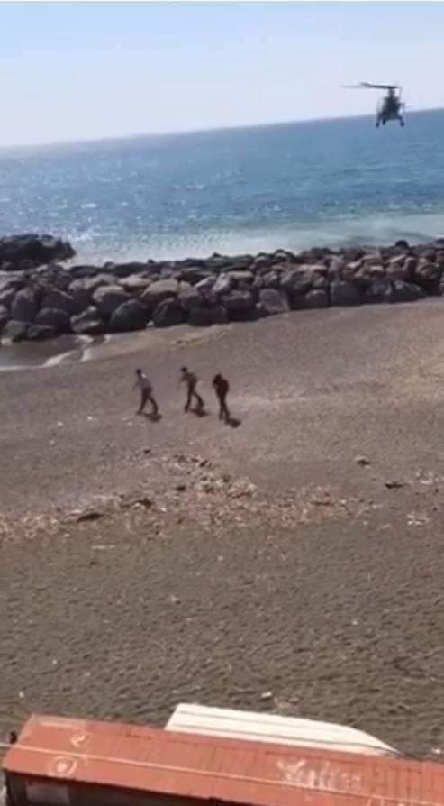 An Italian helicopter landing on the shores of Tripoli