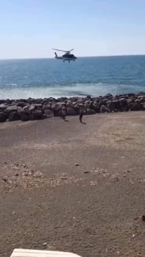 An Italian helicopter landing on the shores of Tripoli