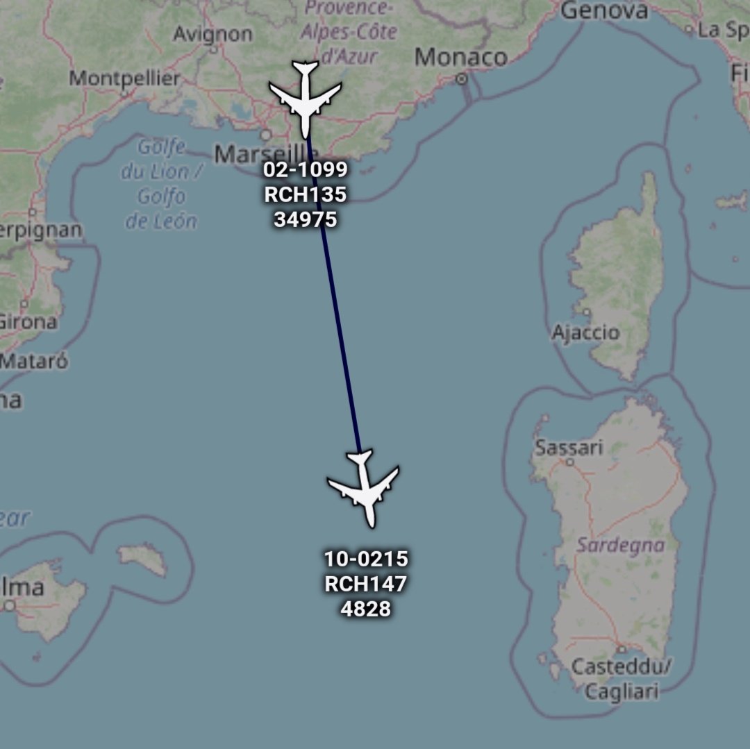 A couple of USAF Boeing C-17A (02-1099, 10-0215) in flight over Western Mediterranean sea southbound