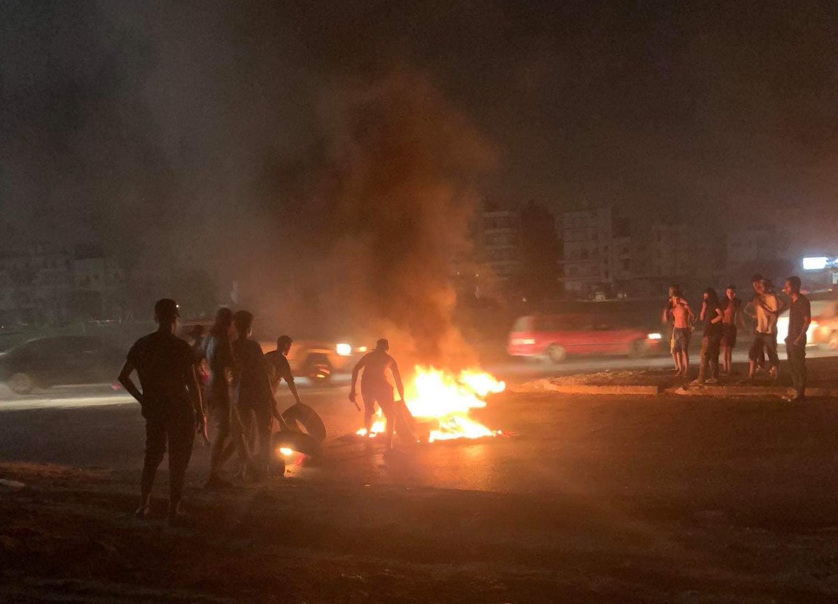 Protesters in Benghazi set fire to tyres in the second night of protests over the deteriorating living conditions