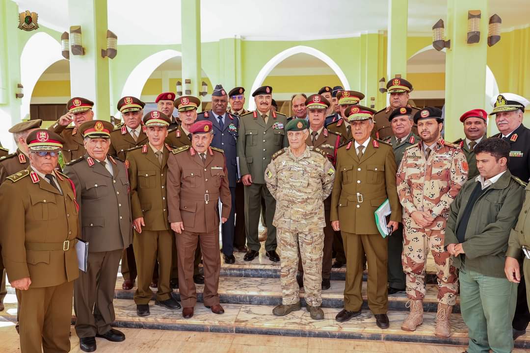 The Commander-in-Chief of the Libyan Arab Armed Forces, Field Marshal Khalifa Abu al-Qasim Haftar, receives Lieutenant General Amer al-Jaqam in his office at the headquarters of the General Command, in the presence of a number of military leaders, after his arrival in the city of Benghazi. Media Office of the General Command of the Libyan Arab Armed Forces