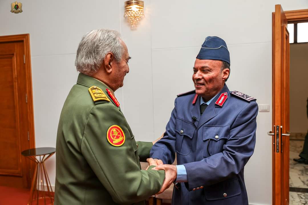 The Commander-in-Chief of the Libyan Arab Armed Forces, Field Marshal Khalifa Abu al-Qasim Haftar, receives Lieutenant General Amer al-Jaqam in his office at the headquarters of the General Command, in the presence of a number of military leaders, after his arrival in the city of Benghazi. Media Office of the General Command of the Libyan Arab Armed Forces