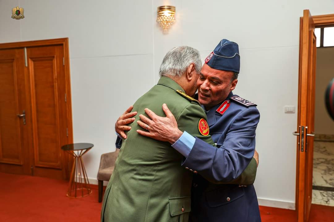 The Commander-in-Chief of the Libyan Arab Armed Forces, Field Marshal Khalifa Abu al-Qasim Haftar, receives Lieutenant General Amer al-Jaqam in his office at the headquarters of the General Command, in the presence of a number of military leaders, after his arrival in the city of Benghazi. Media Office of the General Command of the Libyan Arab Armed Forces